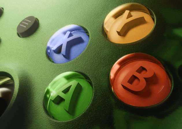 Gros plan sur les boutons ABXY et la coque verte translucide X25
