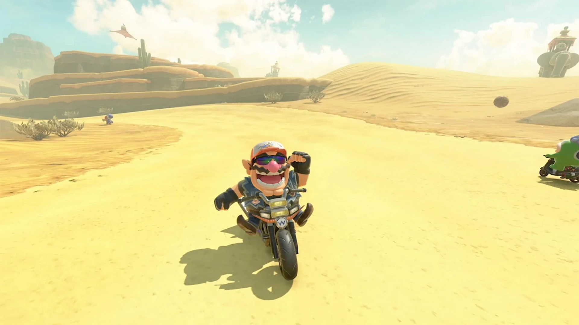 Exploration libre de Mario Kart World dans un paysage désertique